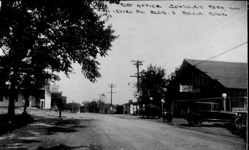 Black and white photo of a city road.