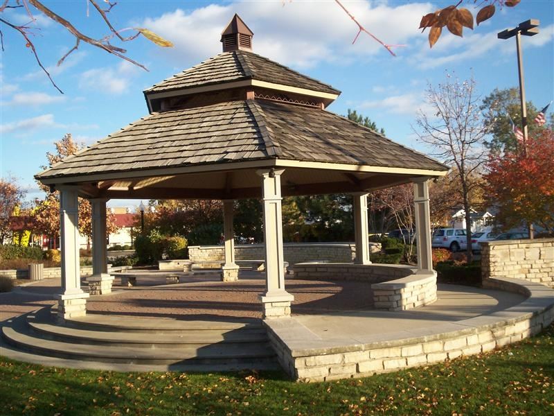 A gazebo on an ornate stone platform.