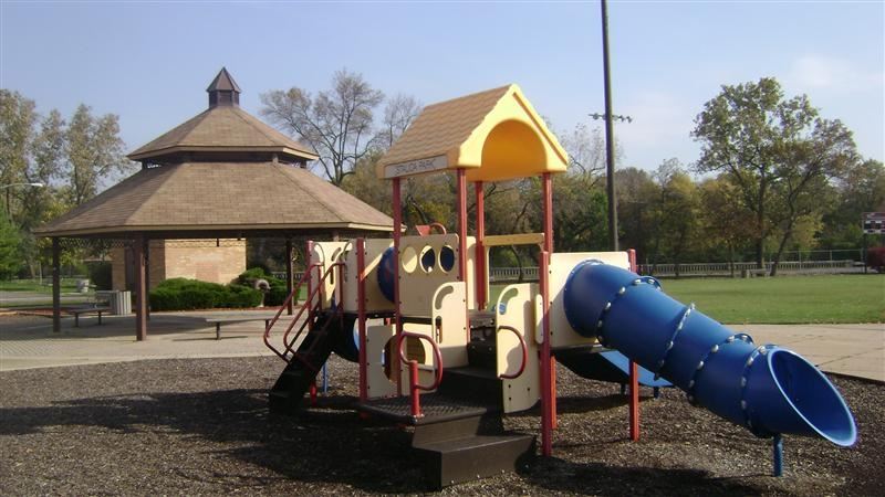 Blue, red, and brown play equipment.